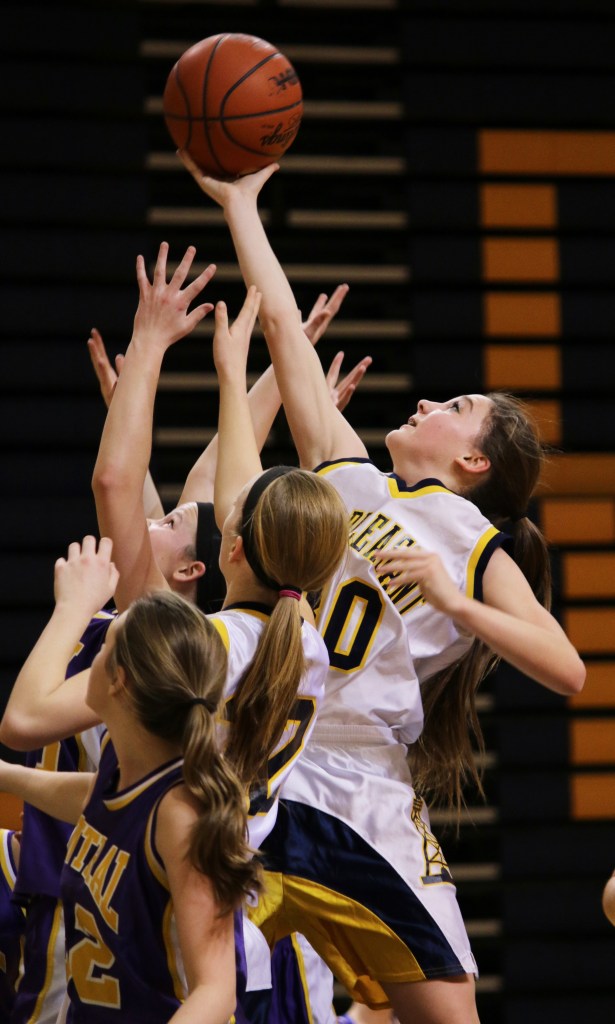 Mount Pleasant High School's Victoria Arends, (30), catches the rebound at the freshman basketball game at Mount Pleasant Highschool,  1155 S. Elizabeth St., Mount Pleasant, Michigan, Thursday, February 5, 2015. Bay City Central beat Mount Pleasant High School 24-22.  