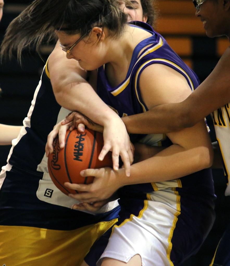 Bay City Central's Natalie Doan, (44), battles for the ball at the freshman basketball game at Mount Pleasant Highschool,  1155 S. Elizabeth St., Mount Pleasant, Michigan, Thursday, February 5, 2015. Bay City Central beat Mount Pleasant High School 24-22.  