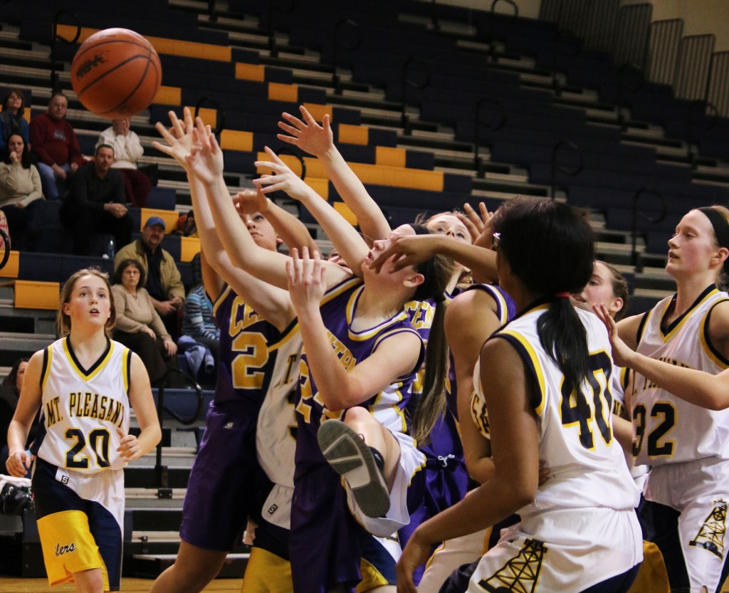 Mount Pleasant High School and  Bay City Central's freshman basketball teams frenzy to catch the ball at the freshman basketball game at Mount Pleasant Highschool,  1155 S. Elizabeth St., Mount Pleasant, Michigan, Thursday, February 5, 2015. Bay City Central beat Mount Pleasant High School 24-22.  