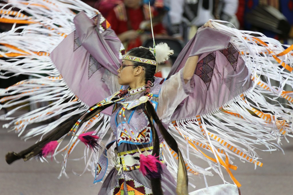 Vanessa Schocko competes at the 26th Annual Celebrating Life Pow wow in McGuirk Arena on the Campus of Central Michigan University, Saturday, March 21, 2015. 
