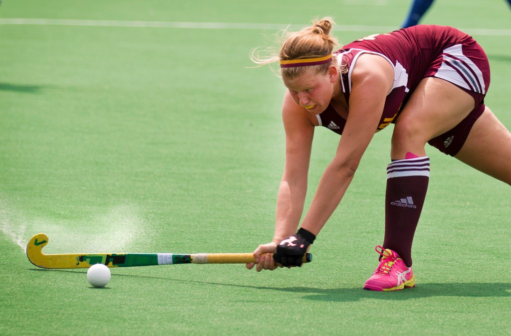 Central Michigan University student Maude Stalars drives the ball down field at the Chippewa field hockey opener Friday, August 28, 2015. Stalars is originally from Belgium and currently plays on the CMU field hockey team as a midfielder.