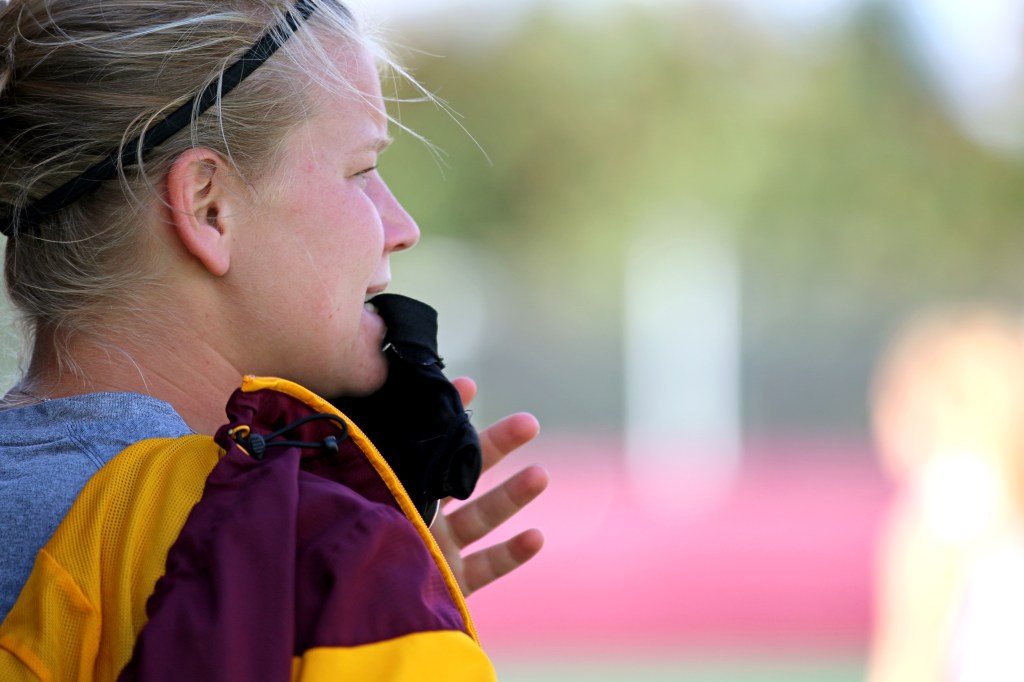 Maude Stalars prepares for field hockey practice in the Central Michigan Field Hockey Stadium on Friday, Oct. 9, 2015.