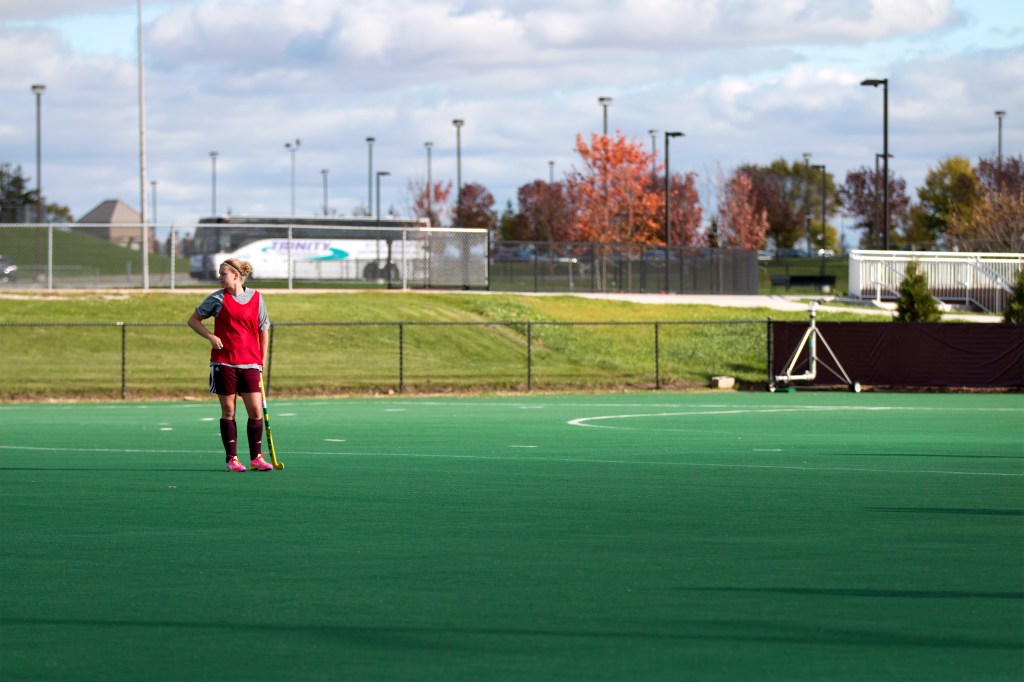 Maude Stalars stands solitarily while waiting for a play during a scrimmage at practice in the Central Michigan Field Hockey Stadium on Friday, Oct. 9, 2015.
